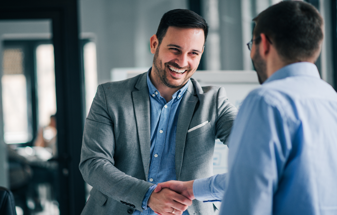 Two businessmen shaking hands